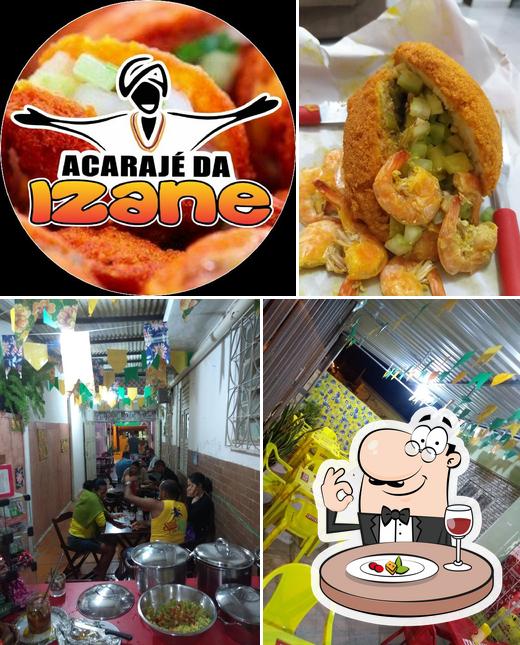 A ilustração da comida e interior no Acarajé Da Izane