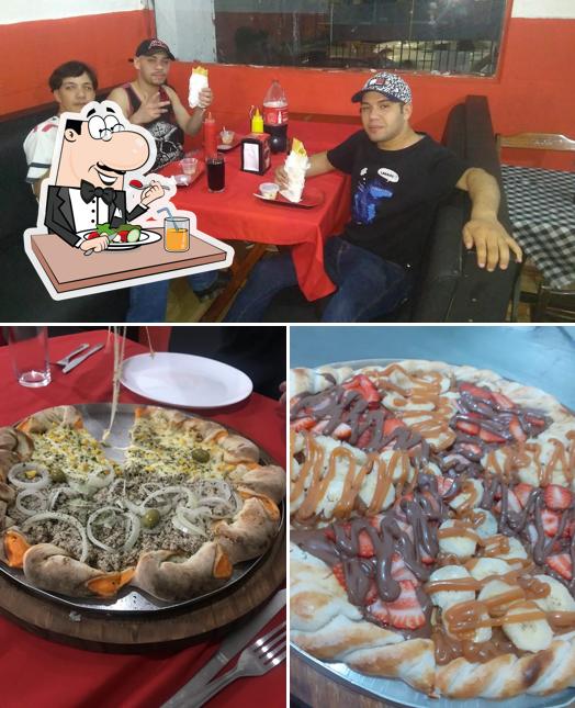 Confira a foto apresentando comida e interior no Pizzaria e pastelaria Du chef