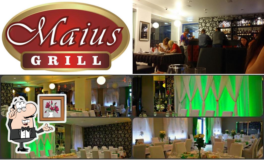 Foto von innere und lebensmittel bei Maius Grill