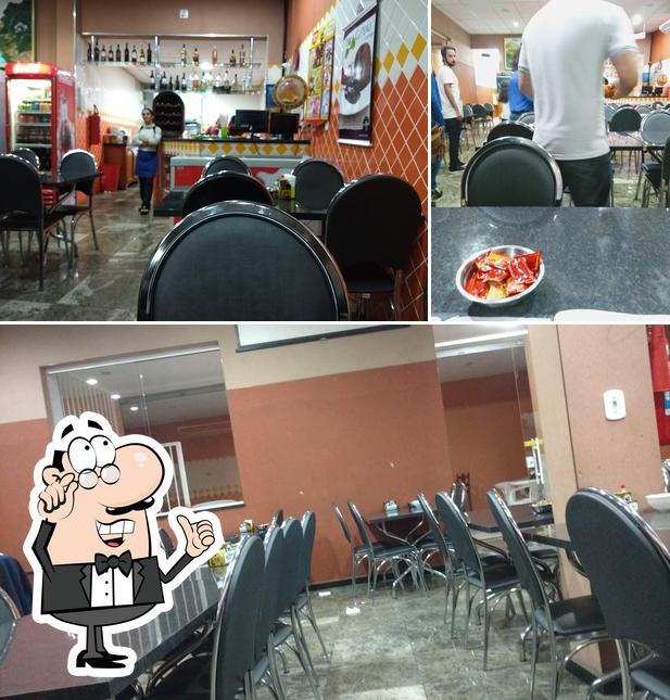 O interior do Pizzaria Rio Sul