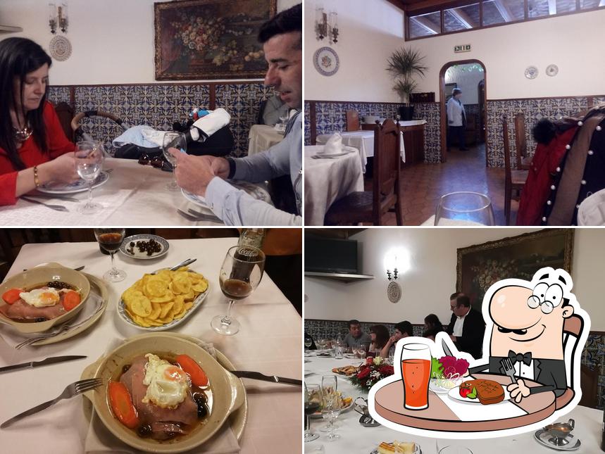 O Restaurante Marisqueira Agudamar se destaca pelo mesa de jantar e interior