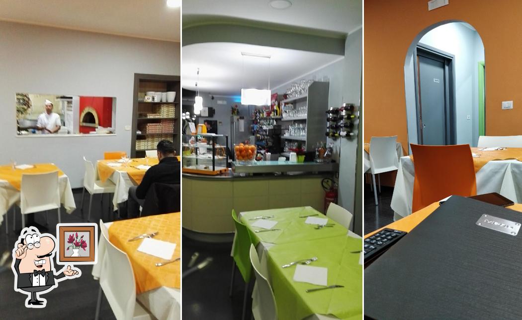 Dai un'occhiata agli interni di Pizzeria Re Leone