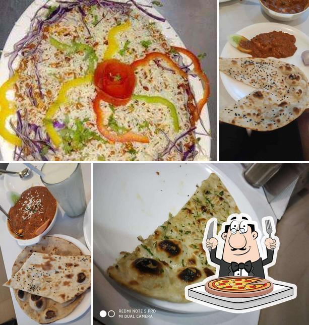 Try out pizza at Priyanka pure veg restaurant