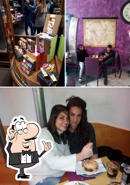 Siediti a un tavolo di Bar Le Muse Fashion Cafè