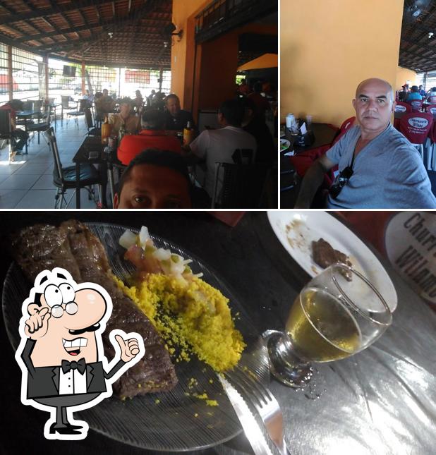 Dê uma olhada a foto apresentando interior e comida no Churrascaria Wilame