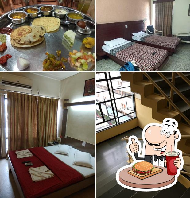 Get a burger at Hotel Panchavati Yatri