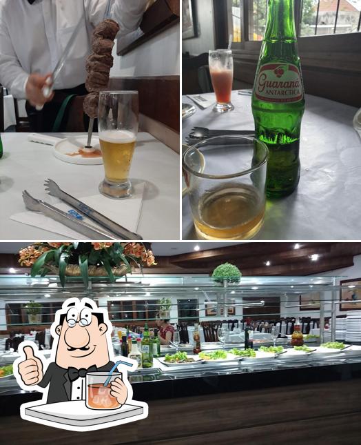 A foto da bebida e comida a Boi de Ouro Churrascaria