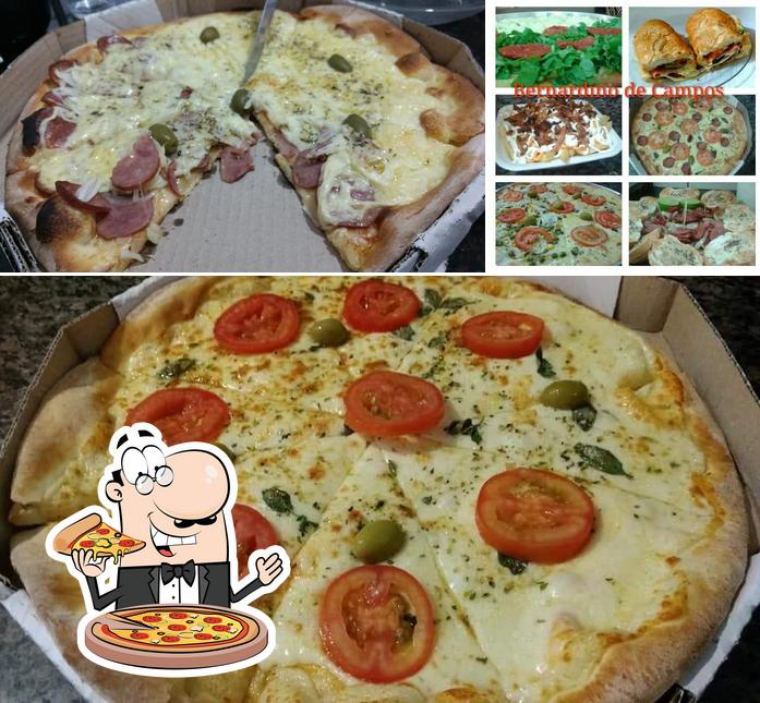 Escolha pizza no Pizzaria Vitória