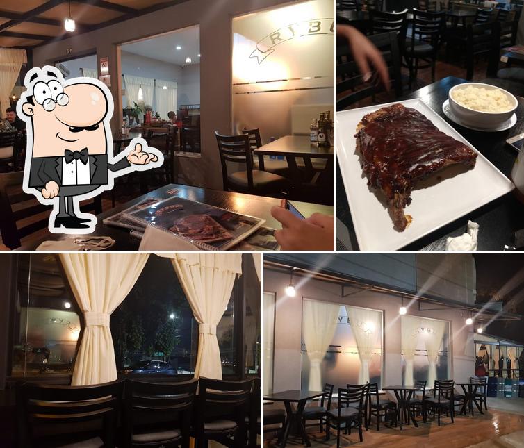 O interior do Rybu Steak House E Boutique