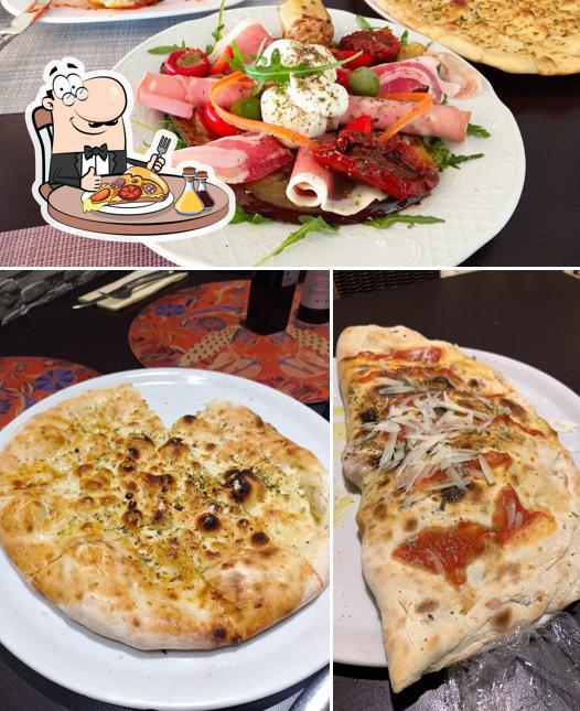 Get pizza at A Cucina 'e Gino