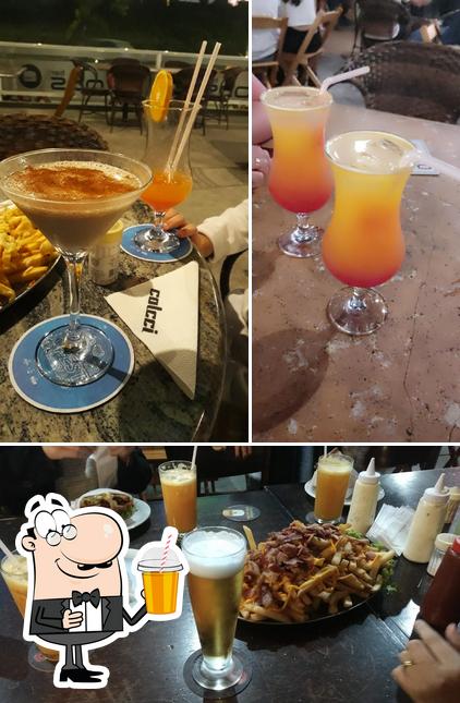 Enjoy a beverage at Obs Bar e Restaurante