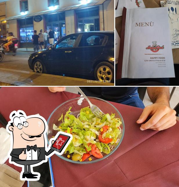 La immagine della esterno e cibo di Happy food