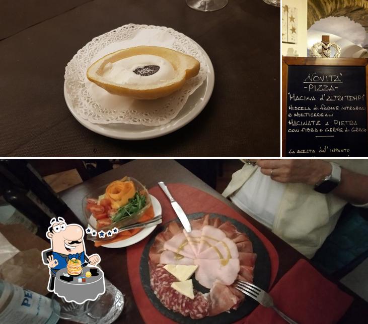 Tra le varie cose da Pizzeria Ristorante la Locanda de Mauris si possono trovare la cibo e lavagna