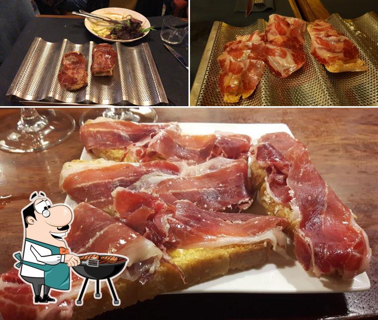 Try out meat dishes at La Viña del Ensanche