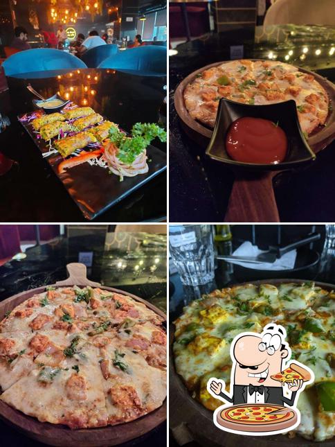 Try out pizza at The Maverick Lounge