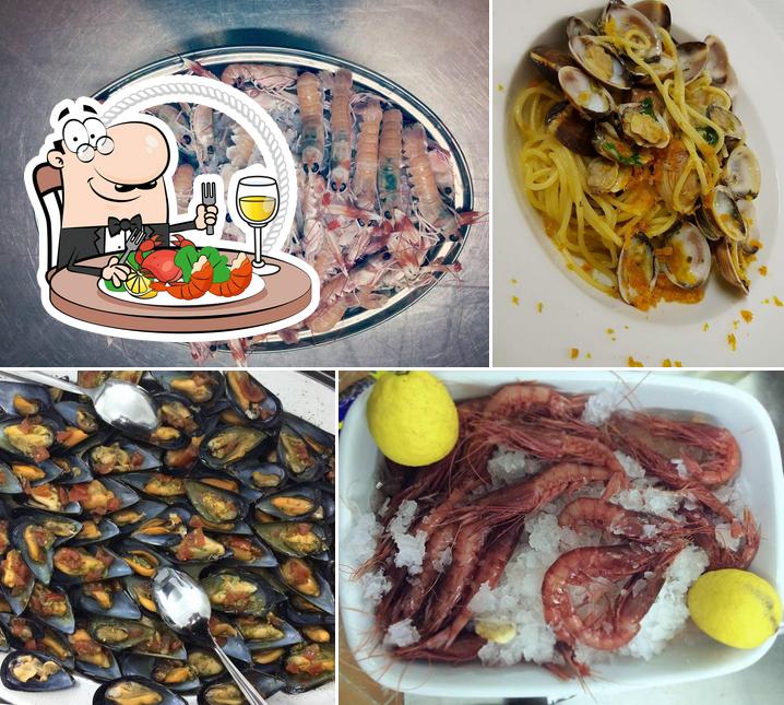 Prenditi la cucina di mare a Ristorante pizzeria "Is Cangialis"