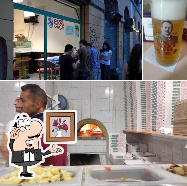 La foto della interni e birra di Pizza Casa