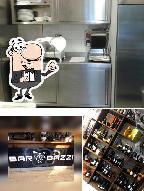 Guarda la foto che presenta la interni e vino di Bazzi