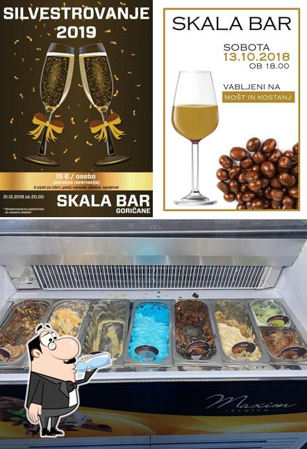 This is the image depicting drink and dessert at Skala bar