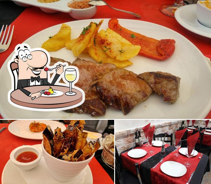 Это снимок, где изображены еда и столики в La teta de la vaca - Bar Restaurante