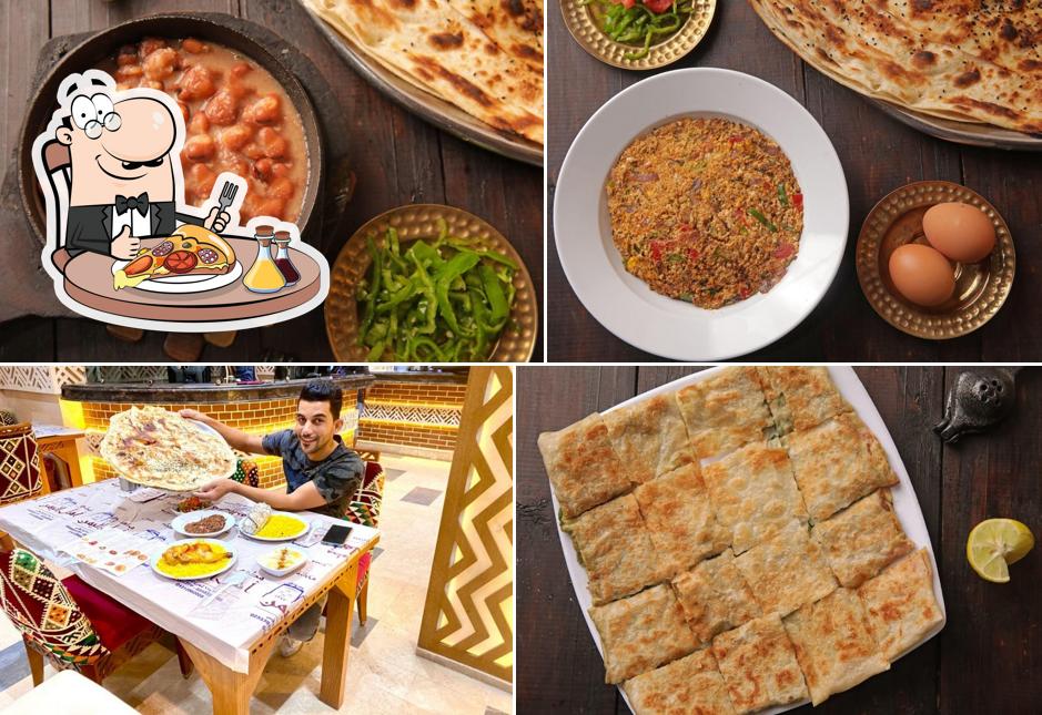 Commandez des pizzas à مطعم أهل اليمن