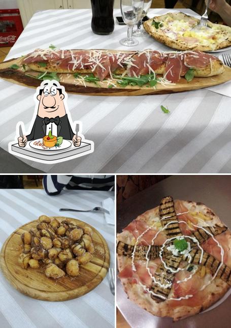 Las fotos de comida y interior en Pizzeria la Divina di Dante