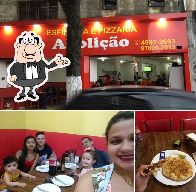 O interior do Pizzaria & Esfiharia Abolição