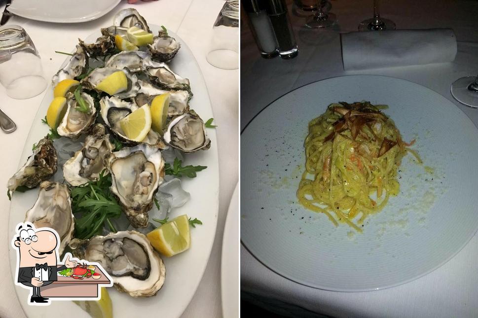 Try out seafood at Ristorante Ostaria Del Villaggio