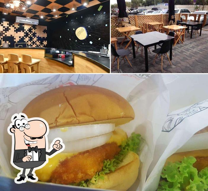 Помимо прочего, в Huff & Puff Burger هف اند بف برجر есть внутреннее оформление и бургеры