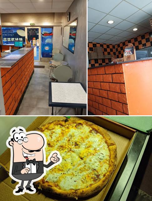 Vérifiez la photo indiquant la intérieur et pizza concernant Pizza Andiamo