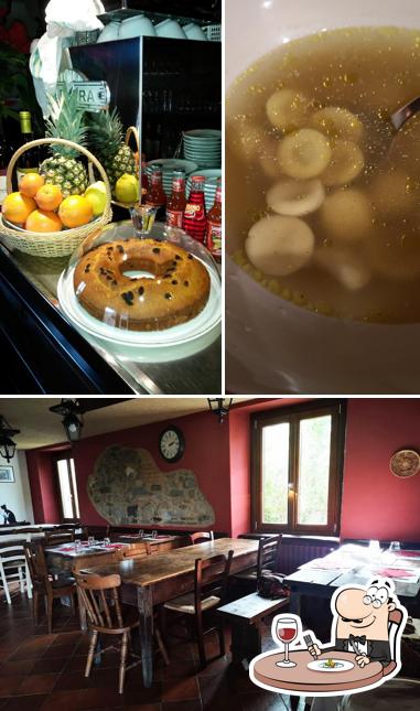 La foto di cibo e tavolo da pranzo da Osteria dei Bassi