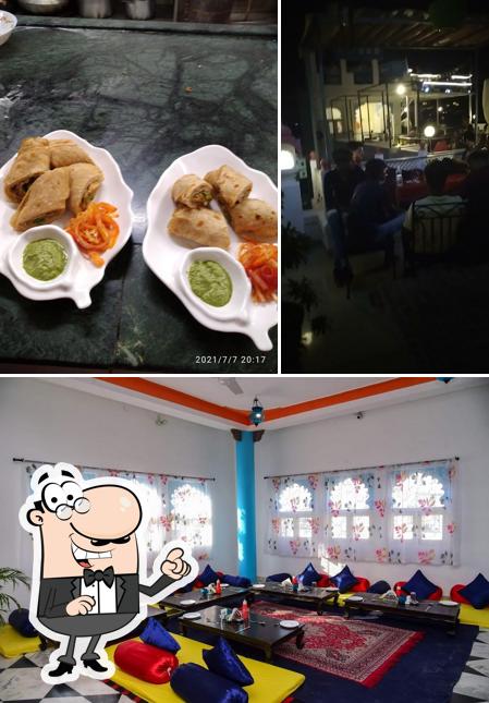 Check out the photo displaying interior and food at Red Sky Restaurant