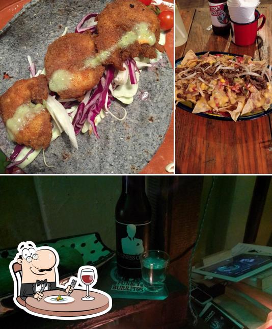 Take a look at the picture depicting food and beer at funky burritos & mezcales