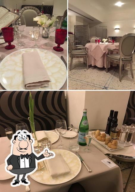 The picture of Villa La Vedetta’s interior and dining table