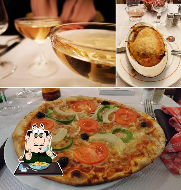 Among different things one can find food and beer at Pizzéria La Stella d'Oro