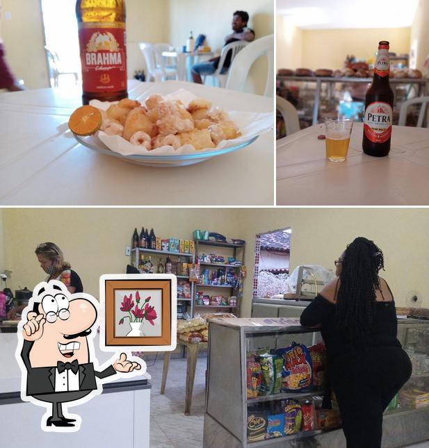 Esta é a foto apresentando interior e cerveja a Bar da Loira