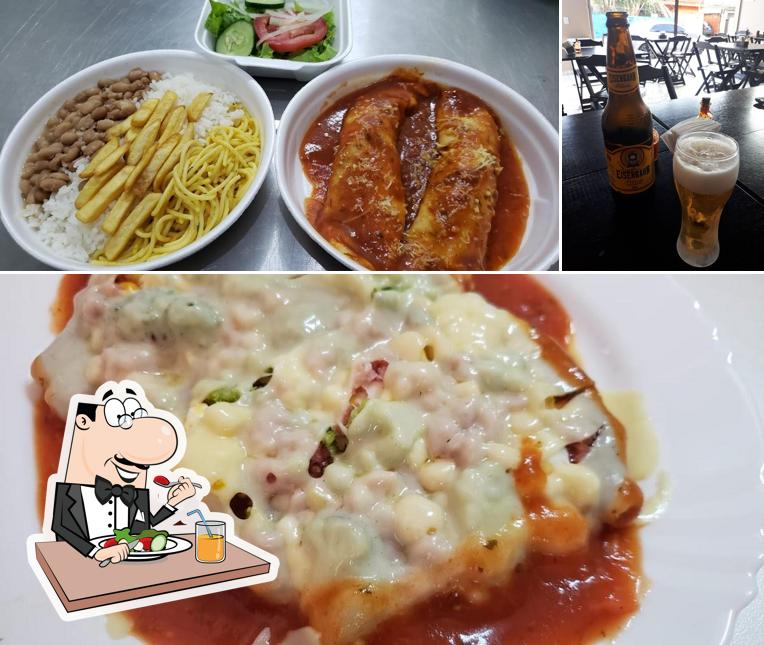 Entre diversos coisas, comida e cerveja podem ser encontrados a Sabores Pimenta Restaurante e Pizzaria