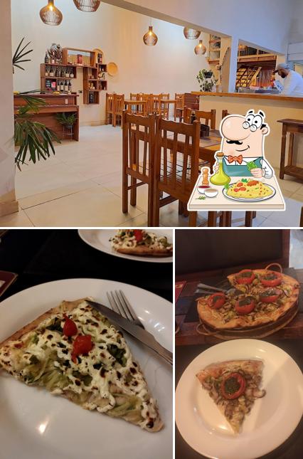 Entre diferentes coisas, comida e interior podem ser encontrados a Artesão Restaurante E Pizzaria