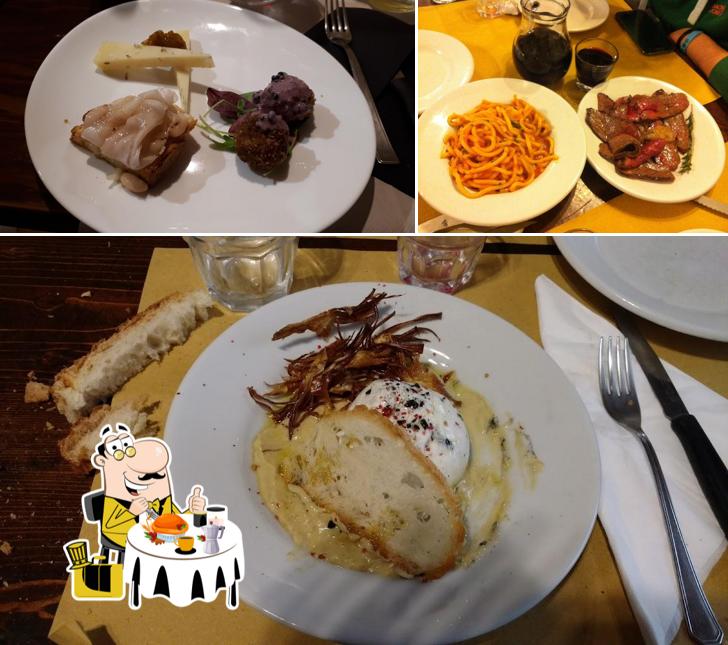 Osteria Del Gatto se distingue par sa nourriture et table à manger