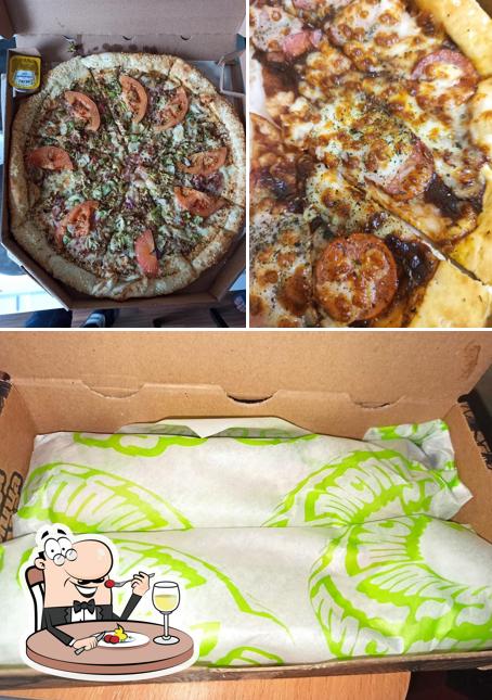 Las imágenes de comida y interior en Пицца Лисицца