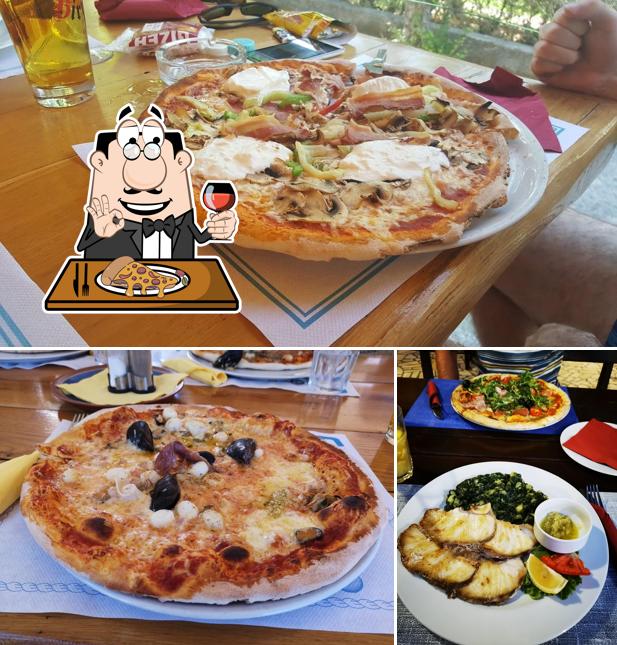 Get pizza at Konoba pizzeria As Janos