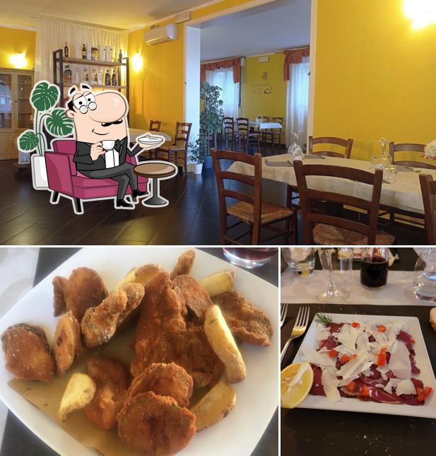 Siediti a un tavolo di Ristorante Pizzeria Il Rosso Della Paola