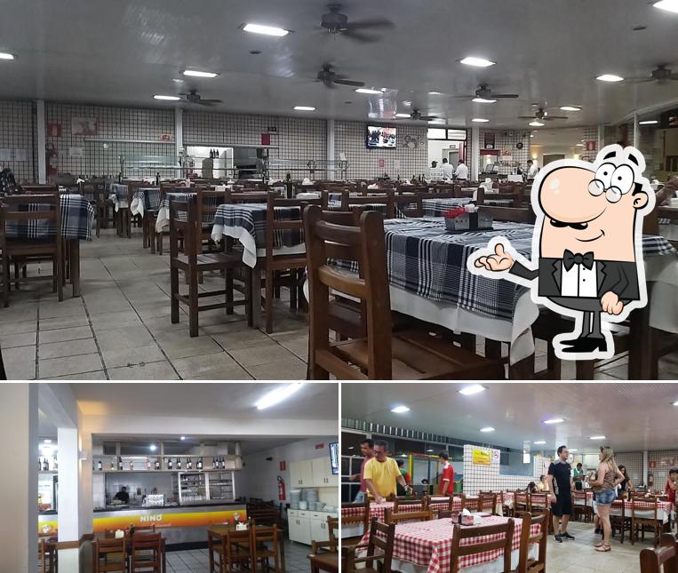 Sente em uma das mesas no Nino Pizzaria