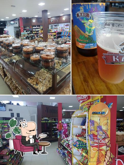 Entre diferentes coisas, interior e cerveja podem ser encontrados no Empório do Pão