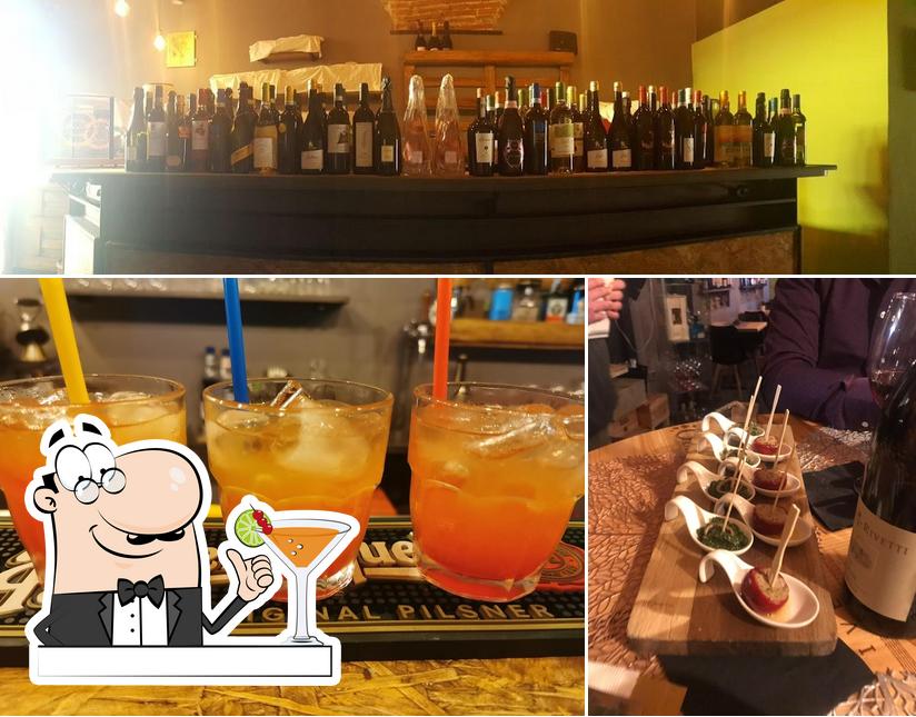 Tra le diverse cose da Bar Le Barrique si possono trovare la bevanda e tavolo da pranzo