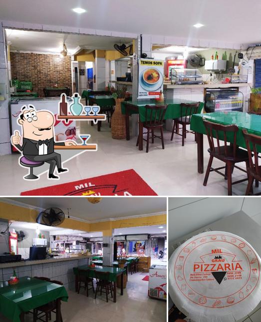 O interior do Pizzaria Mil Grau