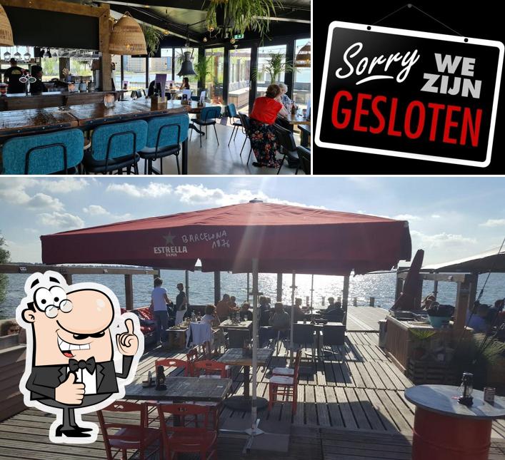 Здесь можно посмотреть фото ресторана "Sun Runners Beach Bar & Food"