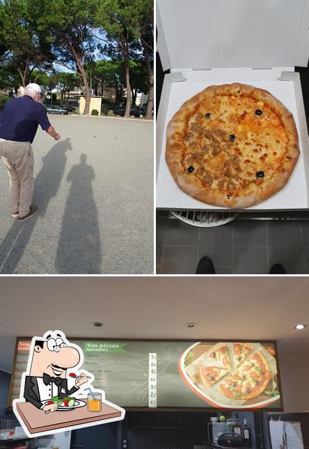 L’image de la nourriture et extérieur concernant Pizza NOTTE