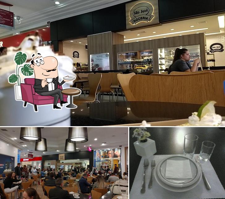 Sente em uma das mesas no Doceria São José
