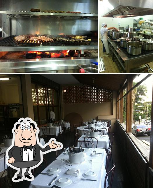 Esta é a foto mostrando interior e comida no Bica Restaurante